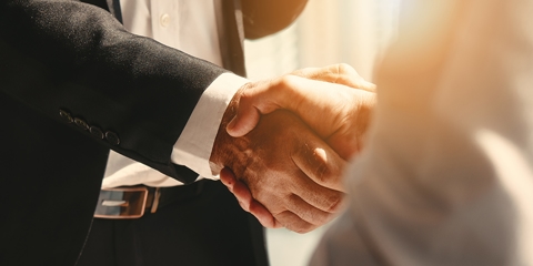 Attorney Shaking a Client's Hand